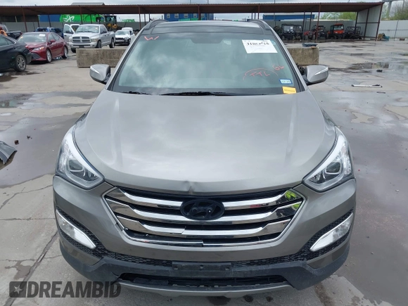 2014 Hyundai Santa Fe with VIN 5XYZU3LB2EG155127, listed as a IAAI auction lot 41864518 with Not provided miles and . Bid and sale history available at DreamBid. Image 13.