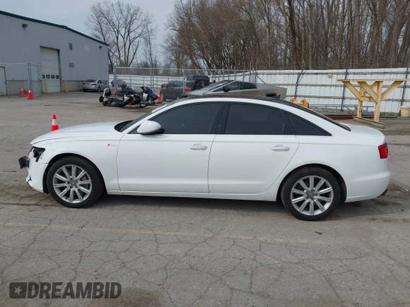 2013 Audi A6 Premium Plus z VIN WAUGGAFC3DN081065, wystawiony jako IAAI lot #41931342 z przebiegiem 136 570 mil mil oraz . Historia ofert i sprzedaży dostępna na DreamBid. Obrazek 14.
