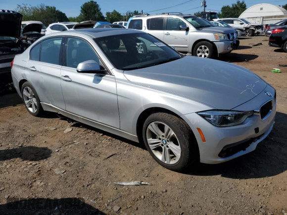 2018 BMW 3 Series with VIN WBA8F1C59JK898499, listed as a Copart auction lot 68247874 with 107,189 mi miles and Salvage title. Bid and sale history available at DreamBid. Image 4.
