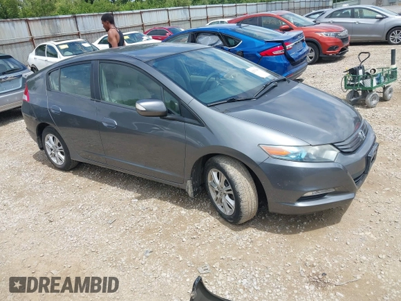 2010 Honda Insight EX with VIN JHMZE2H71AS008487, listed as a IAAI auction lot 42533409 with 95,765 mi miles and . Bid and sale history available at DreamBid. Image 1.