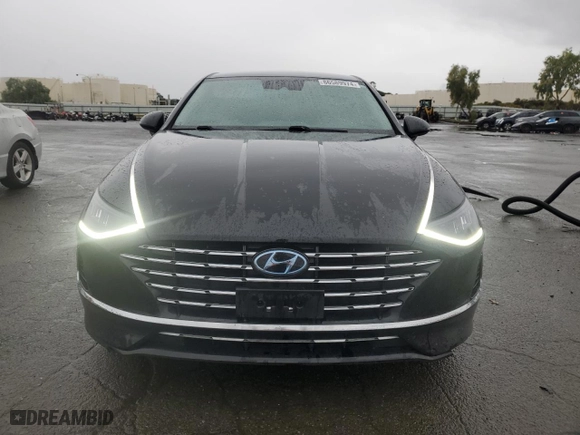 2021 Hyundai Sonata Hybrid SEL with VIN KMHL34JJ2MA019289, listed as a Copart auction lot 86589974 with 76,568 mi miles and Salvage Title. Bid and sale history available at carsss.com. Image 5.