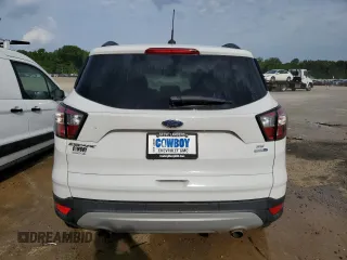2018 Ford Escape SE z VIN 1FMCU9GD5JUB29050, wystawiony jako Copart lot #55166745 z przebiegiem 79 939 mil mil oraz Czysty tytuł • Clean title. Historia ofert i sprzedaży dostępna na DreamBid. Obrazek 6.