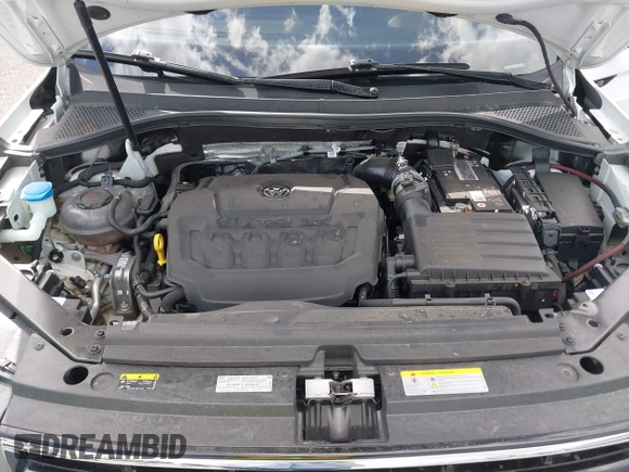 2023 Volkswagen Tiguan SE R-Line Black with VIN 3VVCB7AX3PM133002, listed as a IAAI auction lot 41902721 with 32,915 mi miles and . Bid and sale history available at DreamBid. Image 10.