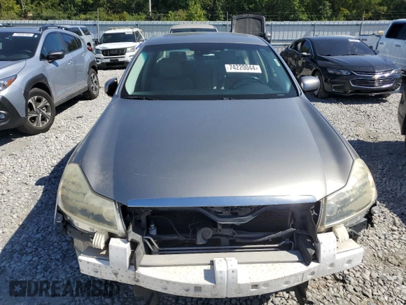 2010 Infiniti M with VIN JN1CY0AP5AM911259, listed as a Copart auction lot 74220044 with 265,925 mi miles and Salvage Title. Bid and sale history available at DreamBid. Image 5.