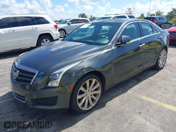 2014 Cadillac ATS Luxury RWD z VIN 1G6AB5RAXE0142079, wystawiony jako IAAI lot #42517963 z przebiegiem 140 118 mil mil oraz . Historia ofert i sprzedaży dostępna na DreamBid. Obrazek 2.