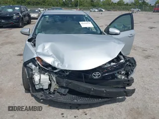2014 Toyota Corolla L with VIN 5YFBURHE9EP160912, listed as a IAAI auction lot 42159372 with 125,863 mi miles and . Bid and sale history available at DreamBid. Image 6.