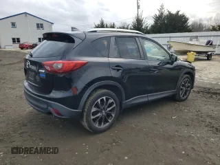 2016 Mazda CX-5 Grand Touring with VIN JM3KE4DY0G0727366, listed as a Copart auction lot 51682115 with 114,462 mi miles and Salvage Title. Bid and sale history available at carsss.com. Image 3.