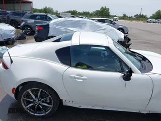 2023 Mazda MX-5 Miata Grand Touring с VIN JM1NDAM71P0560062, выставлен на аукционе IAAI как лот 42065123 с пробегом 11 320 миль миль и . История ставок и продаж доступна на DreamBid. Изображение 17.