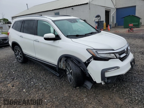 2021 Honda Pilot Elite with VIN 5FNYF6H01MB057789, listed as a Copart auction lot 58543815 with 60,602 mi miles and Salvage title. Bid and sale history available at DreamBid. Image 4.