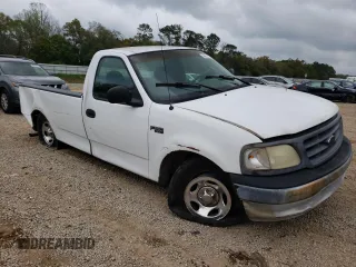 2001 Ford F-150 XL with VIN 3FTZF17201MA44310, listed as a Copart auction lot 73794104 with Not provided miles and Salvage title. Bid and sale history available at DreamBid. Image 4.