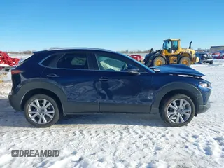 2022 Mazda CX-30 S Select with VIN 3MVDMBBL9NM448264, listed as a IAAI auction lot 41294686 with 9,324 mi miles and . Bid and sale history available at DreamBid. Image 13.