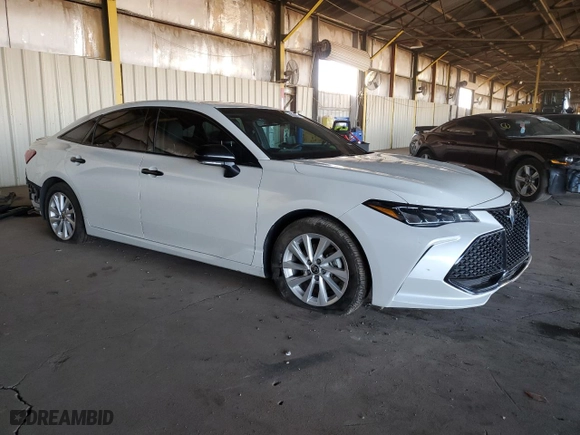 2022 Toyota Avalon Hybrid XSE Nightshade with VIN 4T1EA1AB7NU011386, listed as a Copart auction lot 76712844 with 93,967 mi miles and Clean Title. Bid and sale history available at carsss.com. Image 4.