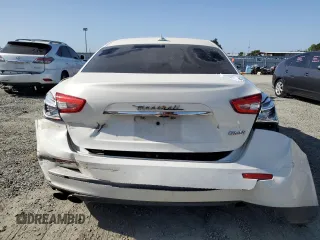 2017 Maserati Ghibli z VIN ZAM57XSAXH1248791, wystawiony jako Copart lot #55975084 z przebiegiem 80 926 mil mil oraz Czysty tytuł • Clean title. Historia ofert i sprzedaży dostępna na DreamBid. Obrazek 6.