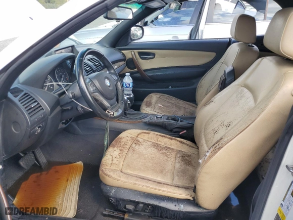 2012 BMW 1 Series 128i with VIN WBAUL7C54CVM83585, listed as a Copart auction lot 74215044 with 0 mi miles and Salvage Title. Bid and sale history available at carsss.com. Image 7.