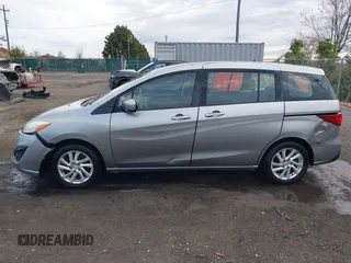 2012 Mazda 5 Sport with VIN JM1CW2BLXC0107933, listed as a IAAI auction lot 41813231 with 164,395 mi miles and . Bid and sale history available at DreamBid. Image 15.