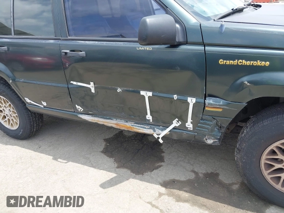 1993 Jeep Grand Cherokee Limited z VIN 1J4GZ78Y7PC531299, wystawiony jako IAAI lot #42117795 z przebiegiem 168 995 mil mil oraz . Historia ofert i sprzedaży dostępna na DreamBid. Obrazek 12.