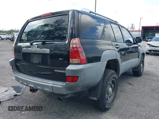 2003 Toyota 4Runner SR5 z VIN JTEZU14RX30007340, wystawiony jako IAAI lot #42361002 z przebiegiem 168 457 mil mil oraz . Historia ofert i sprzedaży dostępna na DreamBid. Obrazek 4.