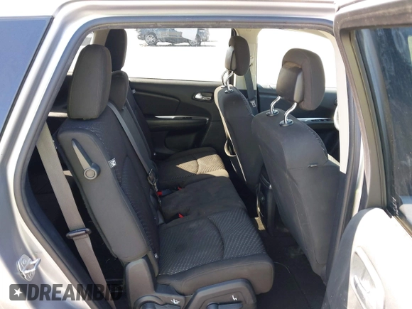 2017 Dodge Journey SE z VIN 3C4PDCAB1HT573511, wystawiony jako IAAI lot #41984865 z przebiegiem 128 721 mil mil oraz . Historia ofert i sprzedaży dostępna na DreamBid. Obrazek 8.