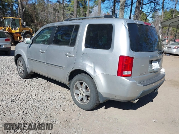 2010 Honda Pilot Touring with VIN 5FNYF4H91AB020868, listed as a IAAI auction lot 41783104 with 298,022 mi miles and . Bid and sale history available at carsss.com. Image 3.