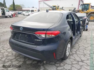 2020 Toyota Corolla Hybrid LE with VIN JTDEBRBE8LJ022596, listed as a IAAI auction lot 41772107 with 49,563 mi miles. Bid and sale history available at carsss.com. Image 4.