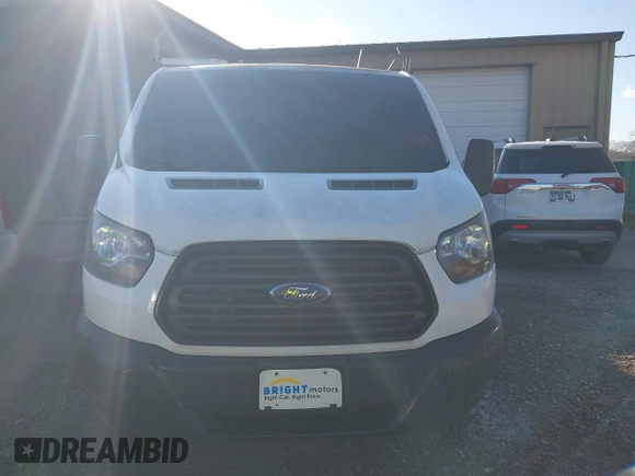 2015 Ford Transit Cargo with VIN 1FTNE1ZM8FKB32441, listed as a IAAI auction lot 41303171 with 203,302 mi miles and . Bid and sale history available at carsss.com. Image 12.