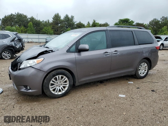 2015 Toyota Sienna XLE with VIN 5TDYK3DC0FS686792, listed as a Copart auction lot 57472045 with 222,663 mi miles and Salvage title. Bid and sale history available at DreamBid. Image 1.
