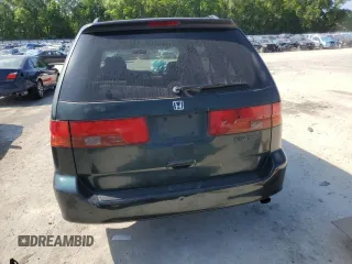 2000 Honda Odyssey EX with VIN 2HKRL1860YH599624, listed as a Copart auction lot 51588625 with Not Provided miles and Salvage Title. Bid and sale history available at DreamBid. Image 6.