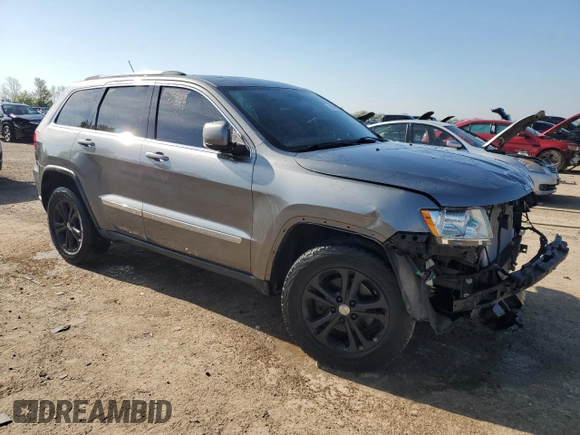 2011 Jeep Grand Cherokee Laredo with VIN 1J4RR4GGXBC642759, listed as a Copart auction lot 55767575 with 144,104 mi miles and Salvage title. Bid and sale history available at DreamBid. Image 4.