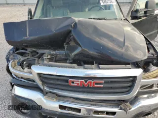 2006 GMC Sierra 3500 DRW SL z VIN 1GTHK33236F115273, wystawiony jako Copart lot #68807084 z przebiegiem 249 002 mil mil oraz Szkody całkowita. Historia ofert i sprzedaży dostępna na DreamBid. Obrazek 13.