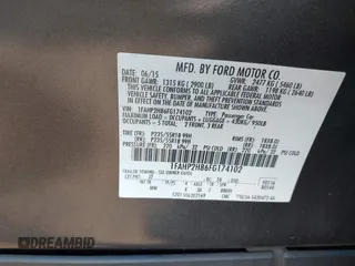 2015 Ford Taurus SEL with VIN 1FAHP2H86FG174102, listed as a IAAI auction lot 40997366 with 132,543 mi miles. Bid and sale history available at carsss.com. Image 9.