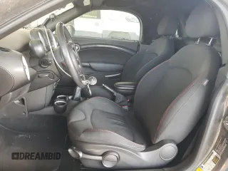 2015 MINI Roadster S z VIN WMWSY3C59FT566785, wystawiony jako Copart lot #73574064 z przebiegiem 96 623 mil mil oraz Tytuł czysty. Historia ofert i sprzedaży dostępna na DreamBid. Obrazek 7.
