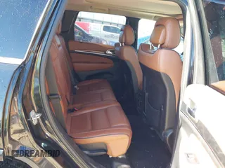 2013 Jeep Grand Cherokee Overland with VIN 1C4RJFCT1DC654653, listed as a IAAI auction lot 41826619 with 124,283 mi miles. Bid and sale history available at carsss.com. Image 8.
