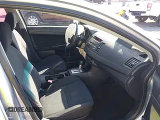 2009 Mitsubishi Lancer DE with VIN JA3AU16UX9U009351, listed as a IAAI auction lot 42139312 with 120,912 mi miles and . Bid and sale history available at carsss.com. Image 5.