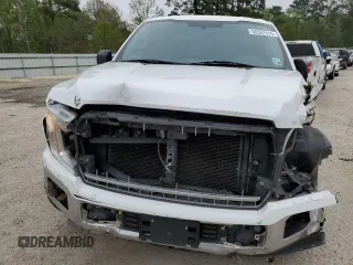 2018 Ford F-150 XL with VIN 1FTEW1C53JKC18828, listed as a Copart auction lot 50357415 with 128,689 mi miles and Salvage Title. Bid and sale history available at DreamBid. Image 5.