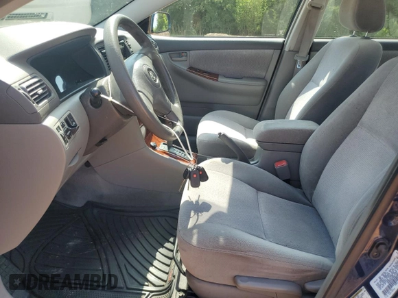 2006 Toyota Corolla CE z VIN 1NXBR32E26Z671451, wystawiony jako Copart lot #61157815 z przebiegiem 200 989 mil mil oraz Czysty tytuł • Clean title. Historia ofert i sprzedaży dostępna na DreamBid. Obrazek 7.