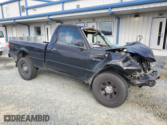 1999 Ford Ranger XL with VIN 1FTYR10C0XTA88744, listed as a Copart auction lot 44258415 with 202,709 mi miles and Salvage title. Bid and sale history available at DreamBid. Image 4.