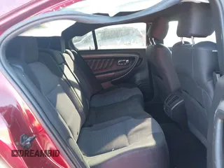 2015 Ford Taurus SEL z VIN 1FAHP2E85FG163421, wystawiony jako IAAI lot #41320489 z przebiegiem 165 618 mil mil oraz . Historia ofert i sprzedaży dostępna na DreamBid. Obrazek 8.