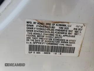 2013 Honda Ridgeline Sport with VIN 5FPYK1F71DB005942, listed as a Copart auction lot 53693385 with 182,385 mi miles and Salvage title. Bid and sale history available at DreamBid. Image 12.