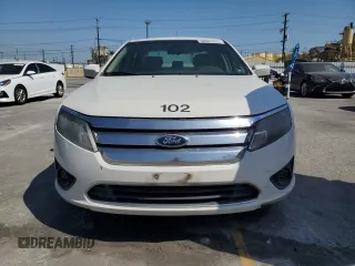 2012 Ford Fusion SE z VIN 3FAHP0HA9CR122037, wystawiony jako Copart lot #58367255 z przebiegiem 136 266 mil mil oraz Czysty tytuł • Clean title. Historia ofert i sprzedaży dostępna na DreamBid. Obrazek 5.