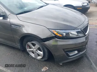 2015 Kia Optima LX with VIN 5XXGM4A72FG400848, listed as a IAAI auction lot 40802198 with 173,270 mi miles and . Bid and sale history available at DreamBid. Image 18.
