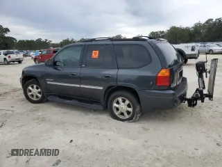 2006 GMC Envoy SLE with VIN 1GKDS13S562135135, listed as a Copart auction lot 88353995 with 159,251 mi miles and Salvage Title. Bid and sale history available at carsss.com. Image 2.