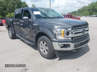 2018 Ford F-150 XL with VIN 1FTEW1E57JFA95086, listed as a IAAI auction lot 42574704 with 77,301 mi miles and . Bid and sale history available at DreamBid. Image 1.