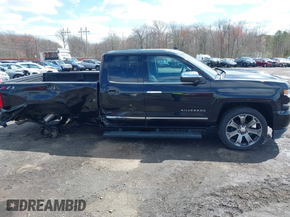 2018 Chevrolet Silverado 1500 with VIN 1GCVKSEC3JZ125571, listed as a IAAI auction lot 41982881 with 58,410 mi miles and . Bid and sale history available at DreamBid. Image 13.