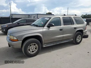 2001 Dodge Durango z VIN 1B4HS28N01F500549, wystawiony jako Copart lot #65836855 z przebiegiem 73 486 mil mil oraz Czysty tytuł • Clean title. Historia ofert i sprzedaży dostępna na DreamBid. Obrazek 1.