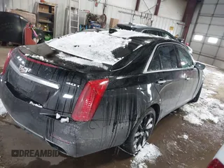2016 Cadillac CTS Luxury Collection AWD with VIN 1G6AX5SX6G0111768, listed as a IAAI auction lot 41563991 with 76,718 mi miles and . Bid and sale history available at DreamBid. Image 4.