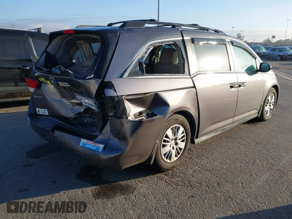 2015 Honda Odyssey LX с VIN 5FNRL5H27FB068761, выставлен на аукционе IAAI как лот 41479420 с пробегом 84 532 миль миль и . История ставок и продаж доступна на DreamBid. Изображение 4.
