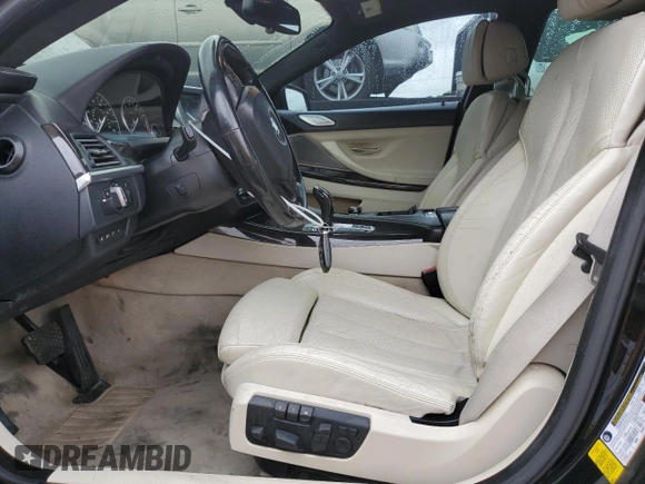 2014 BMW 6 Series 650i z VIN WBA6B2C5XED128959, wystawiony jako Copart lot #44201745 z przebiegiem 146 875 mil mil oraz Szkoda całkowita • Salvage title. Historia ofert i sprzedaży dostępna na DreamBid. Obrazek 7.
