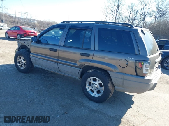 1999 Jeep Grand Cherokee Laredo with VIN 1J4GW58NXXC623753, listed as a IAAI auction lot 41685540 with 190,134 mi miles and . Bid and sale history available at DreamBid. Image 3.