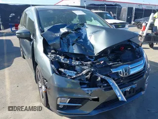 2020 Honda Odyssey Touring z VIN 5FNRL6H8XLB035047, wystawiony jako IAAI lot #41794343 z przebiegiem 57 537 mil mil oraz . Historia ofert i sprzedaży dostępna na DreamBid. Obrazek 6.