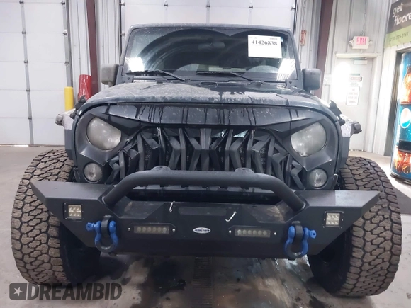 2018 Jeep Wrangler JK Unlimited Sport with VIN 1C4BJWDG0JL867687, listed as a IAAI auction lot 41426838 with 78,116 mi miles. Bid and sale history available at carsss.com. Image 12.